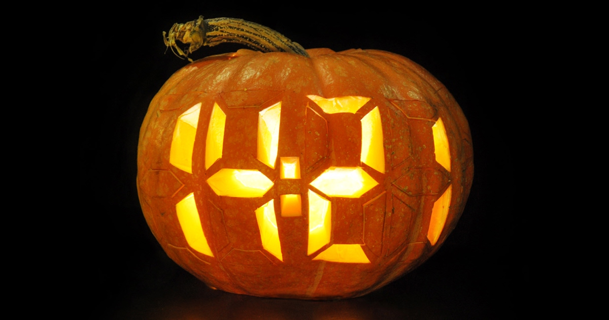 Show HN: Halloween Clock – a digital clock carved from pumpkin